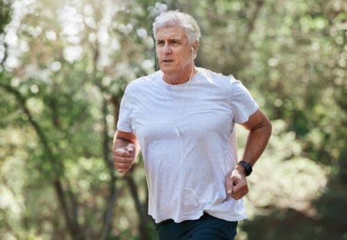 elderly man exercises outdoors