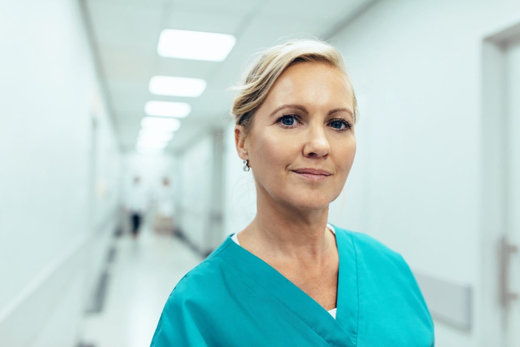 woman healthcare worker standing in hospital